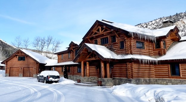 Alpine Log Homes In The Snow